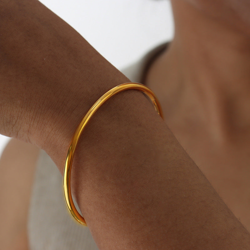 Bracelet à Anneaux Rétro Français  – Design Épuré et Intemporel